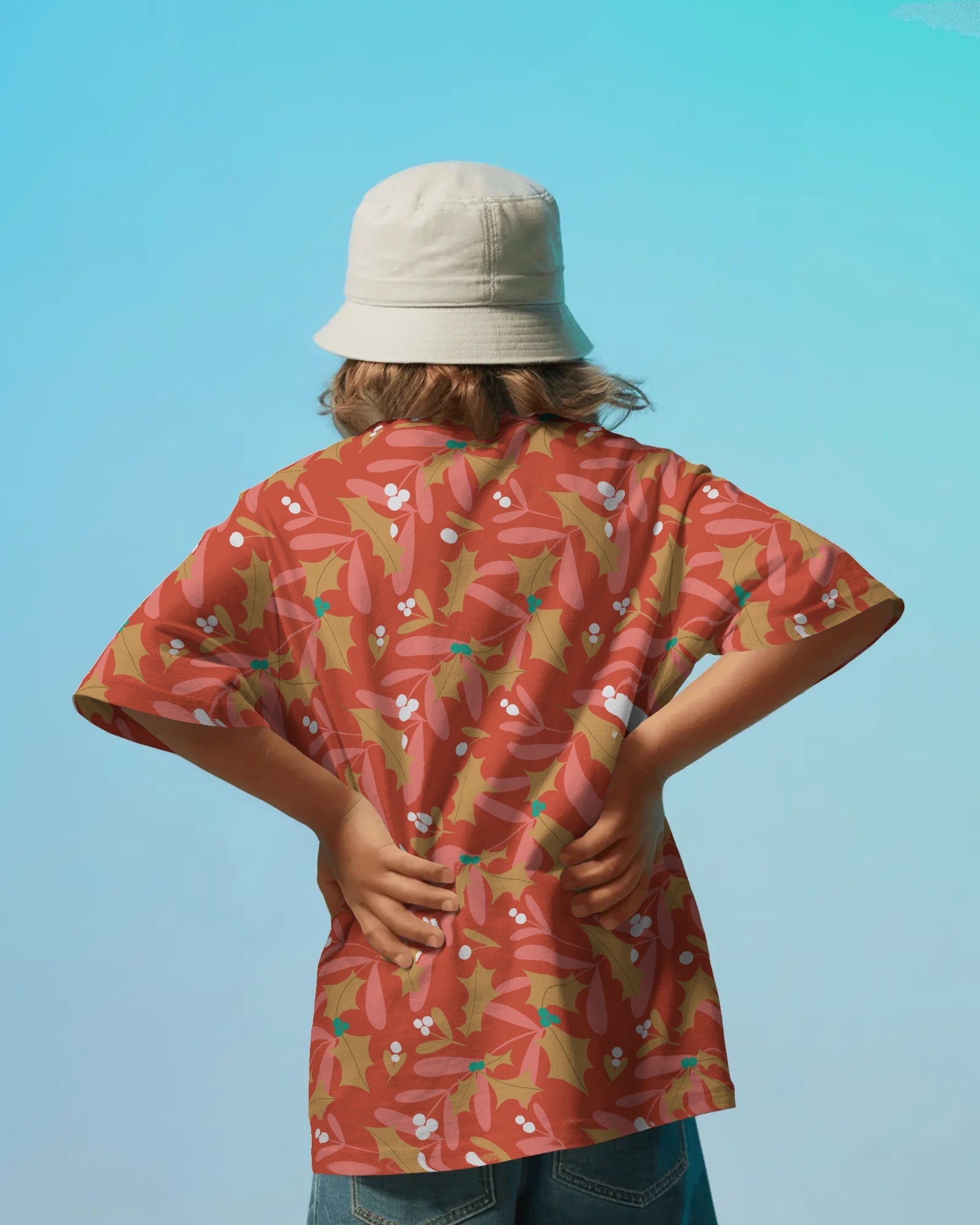 Mistletoe and Holly™ Orange Festive Pattern by Charlotte Design